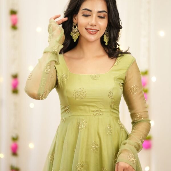 Radiant Pista Green Rangoli Silk Anarkali Gown with Gold Bead Work