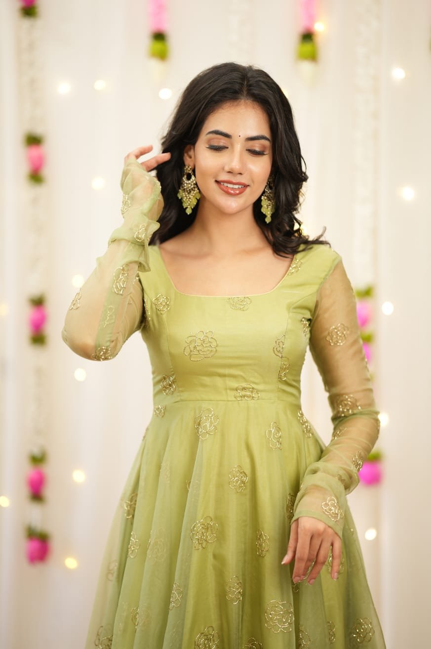 Radiant Pista Green Rangoli Silk Anarkali Gown with Gold Bead Work